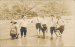 (Group Wading in a River)
